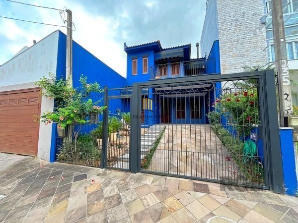 Casa em Porto Alegre, no bairro Hípica, com 3 dormitório(s), e 3 banheiros, à venda. - Pilar Imóveis