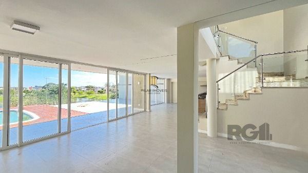 Casa Condominio em Porto Alegre, no bairro Hípica, com 3 dormitório(s), e 3 banheiros, à venda.