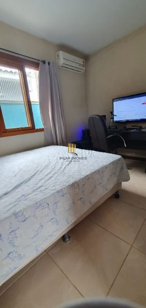 Casa em Porto Alegre, no bairro Hípica, com 2 dormitório(s), e 2 banheiros, à venda.