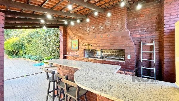 Casa Condominio em Porto Alegre, no bairro Cavalhada, com 4 dormitório(s), e 4 banheiros, à venda.