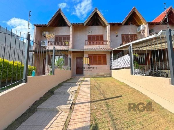 Casa em Porto Alegre, no bairro Guarujá, com 3 dormitório(s), e 3 banheiros, à venda. - Pilar Imóveis