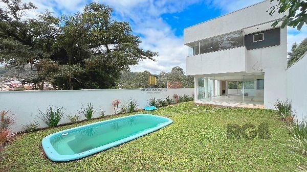 Casa Condominio em Porto Alegre, no bairro Hípica, com 3 dormitório(s), à venda.