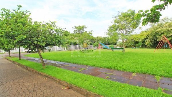 Casa em Porto Alegre, no bairro Hípica, com 3 dormitório(s), e 3 banheiros, à venda.