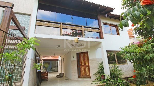 Casa em Porto Alegre, no bairro Hípica, com 3 dormitório(s), e 3 banheiros, à venda. - Pilar Imóveis
