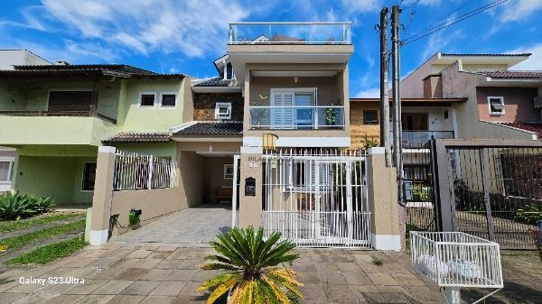 Casa em Porto Alegre, no bairro Hípica, com 3 dormitório(s), e 3 banheiros, à venda. - Pilar Imóveis