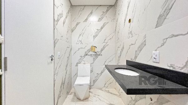 Casa Condominio em Porto Alegre, no bairro Hípica, com 3 dormitório(s), e 3 banheiros, à venda.