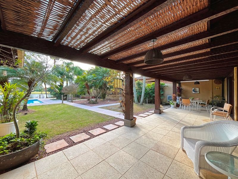 Terra Ville - Casa com 384 m² - fundo para o lago , semi mobiliada , com 3 suites e piscina .