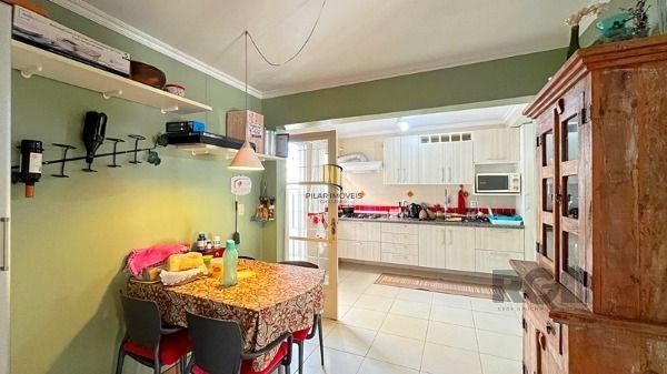 Casa Condominio em Porto Alegre, no bairro Santa Tereza, com 3 dormitório(s), e 3 banheiros, à venda.