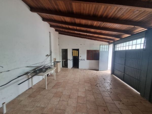 Casa 4 dormitórios no bairro Camaquã