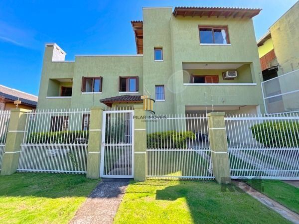 Sobrado 4 dormitórios no bairro Camaquã - Pilar Imóveis