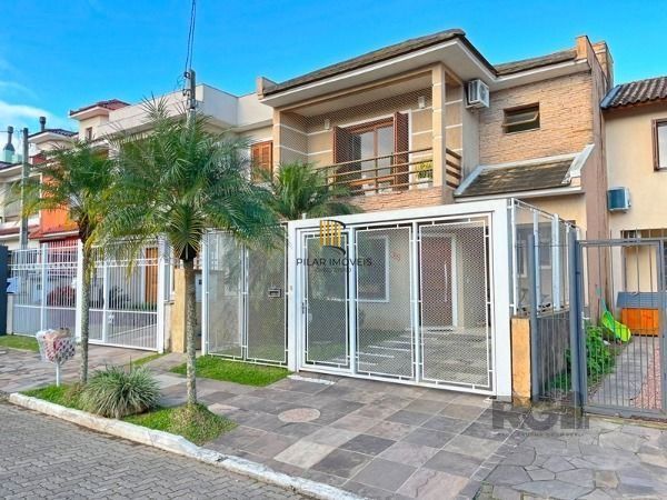 Casa em Porto Alegre, no bairro Hípica, com 3 dormitório(s), e 3 banheiros, à venda.