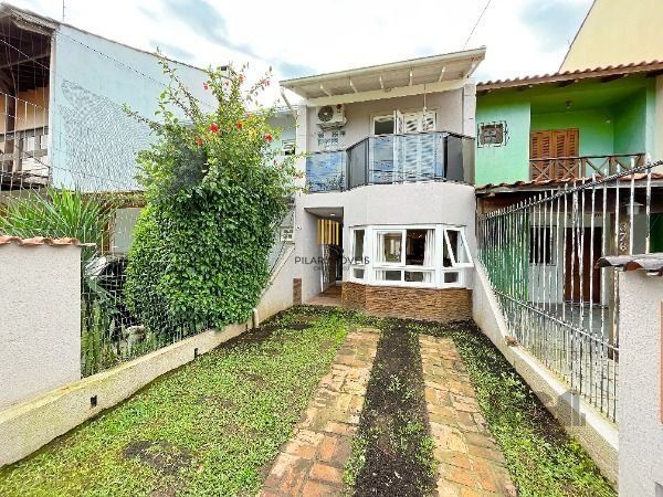 Casa em Porto Alegre, no bairro Hípica, com 2 dormitório(s), e 2 banheiros, à venda. - Pilar Imóveis
