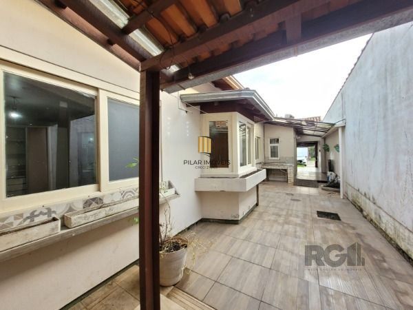Casa Condominio em Porto Alegre, no bairro Hípica, com 3 dormitório(s), e 3 banheiros, à venda.