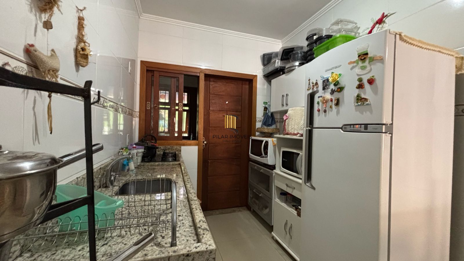 Casa 3 dormitórios no bairro Guarujá