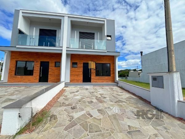 Casa Condominio em Porto Alegre, no bairro Campo Novo, com 3 dormitório(s), e 3 banheiros, à venda.
