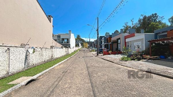 Casa Condominio em Porto Alegre, no bairro Hípica, com 3 dormitório(s), e 3 banheiros, à venda.