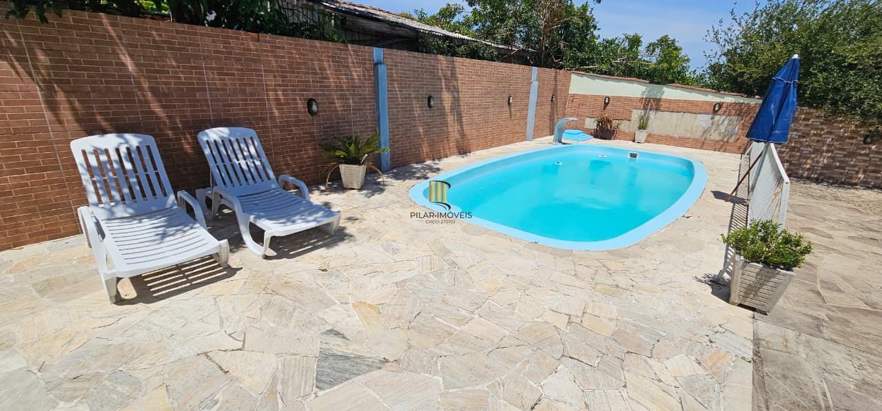 Casa 4 dormitórios no bairro Restinga