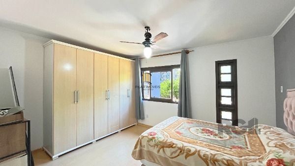 Casa 4 dormitórios no bairro Camaquã