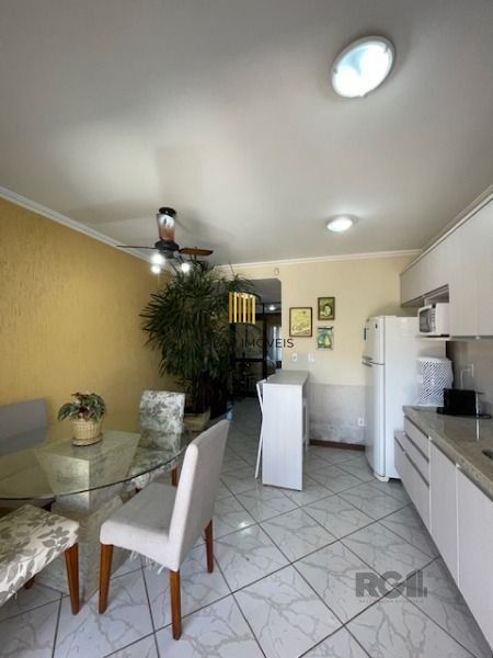 Casa em Porto Alegre, no bairro Hípica, com 3 dormitório(s), e 3 banheiros, à venda.