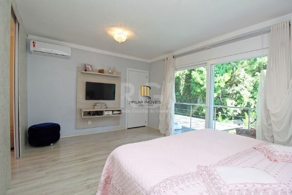 Casa Condominio em Porto Alegre, no bairro Hípica, com 3 dormitório(s), e 3 banheiros, à venda.