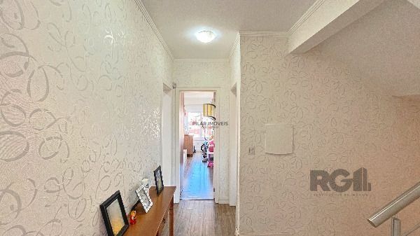 Casa em Porto Alegre, no bairro Hípica, com 3 dormitório(s), e 3 banheiros, à venda.