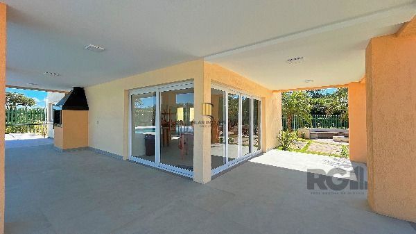 Casa Condominio em Porto Alegre, no bairro Hípica, com 3 dormitório(s), e 3 banheiros, à venda.
