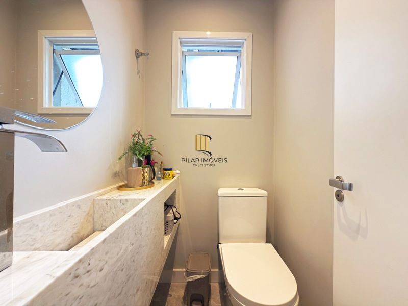 Casa 4 dormitórios no bairro Camaquã