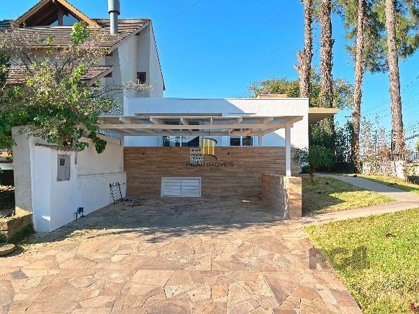 Casa Condominio em Porto Alegre, no bairro Hípica, com 3 dormitório(s), e 3 banheiros, à venda.