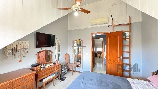 Casa Condominio em Porto Alegre, no bairro Cavalhada, com 3 dormitório(s), e 3 banheiros, à venda.