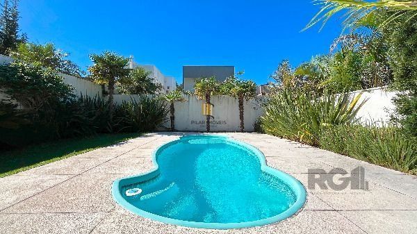Casa Condominio em Porto Alegre, no bairro Hípica, com 3 dormitório(s), e 3 banheiros, à venda.