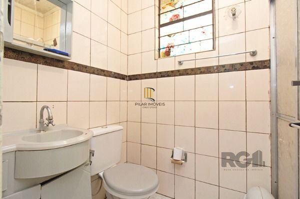 Casa em Porto Alegre, no bairro Cavalhada, com 4 dormitório(s), e 4 banheiros, à venda.