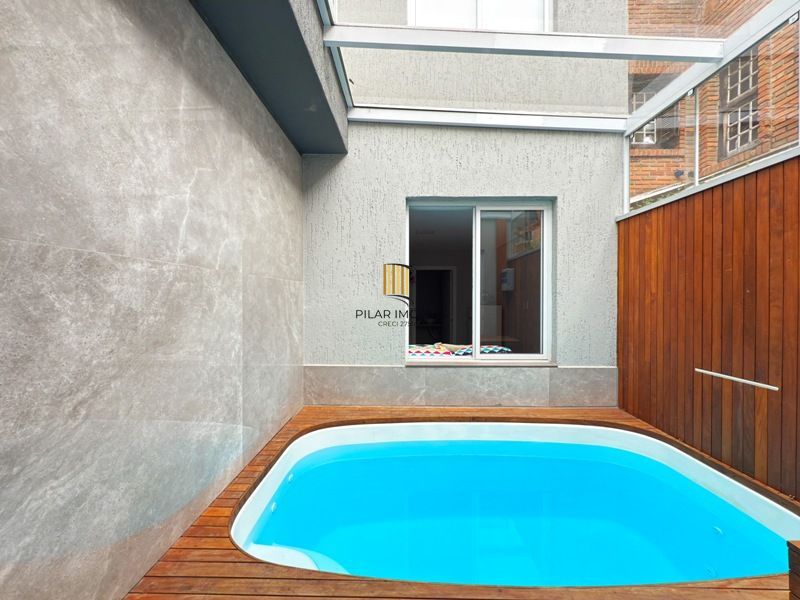 Casa 4 dormitórios no bairro Camaquã