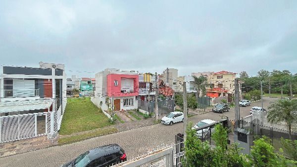 Casa em Porto Alegre, no bairro Hípica, com 3 dormitório(s), e 3 banheiros, à venda.