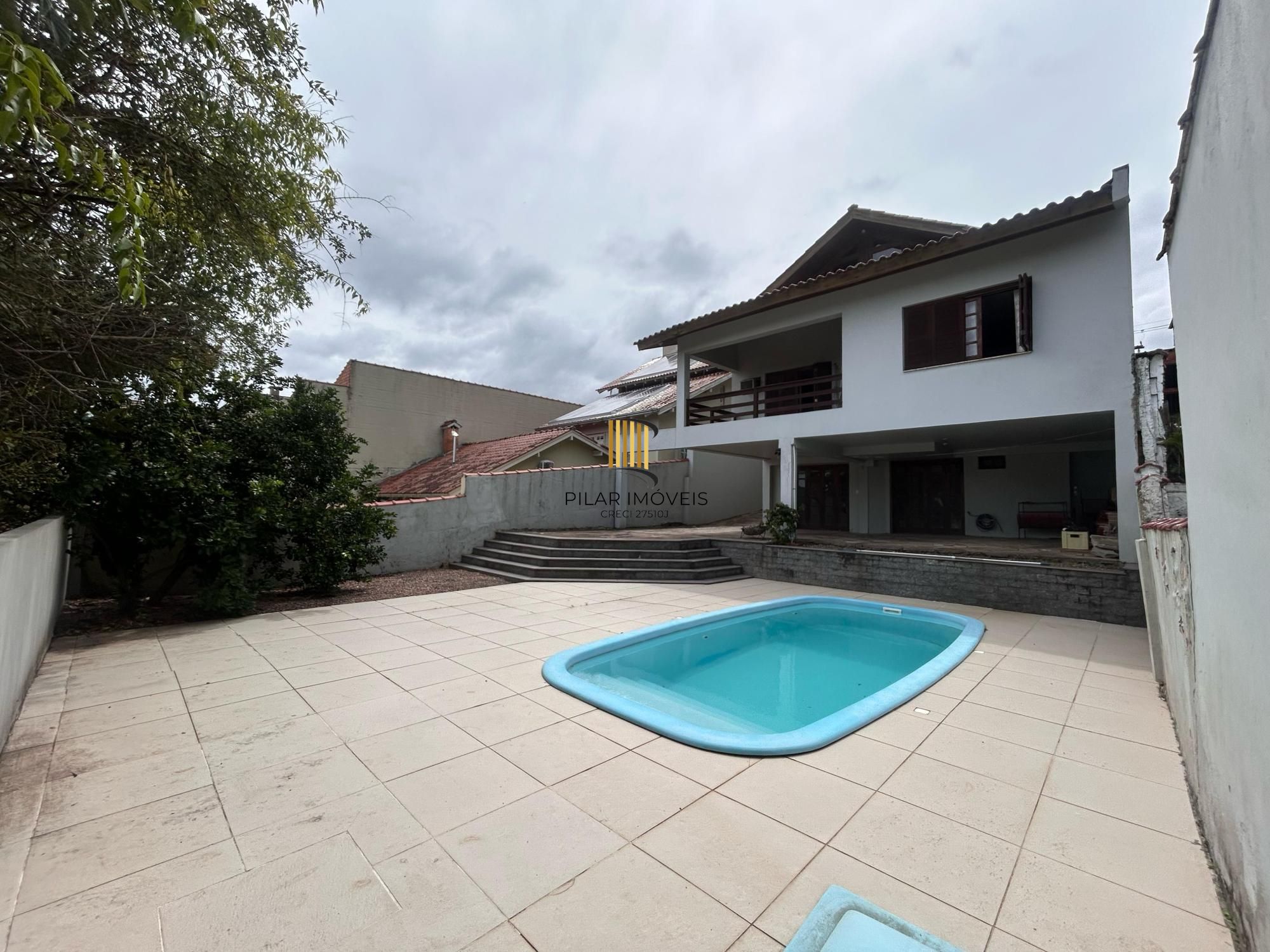Casa 3 dormitórios no bairro Partenon