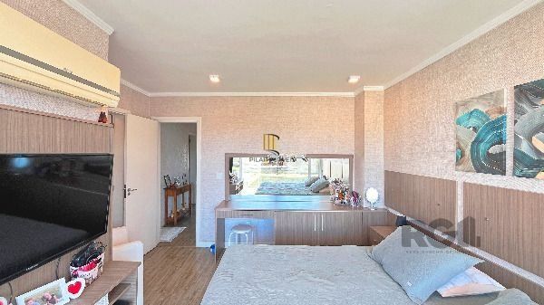 Casa em Porto Alegre, no bairro Hípica, com 3 dormitório(s), e 3 banheiros, à venda.