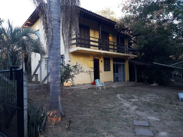 Sítio em Porto Alegre, no bairro Hípica, com 2 dormitório(s), e 2 banheiros, à venda.
