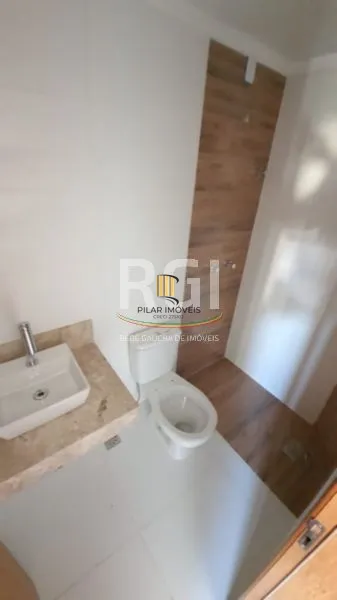 Casa 3 dormitórios no bairro Guarujá