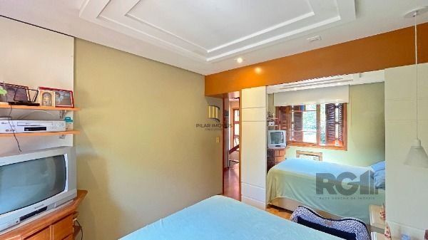 Casa Condominio em Porto Alegre, no bairro Espírito Santo, com 3 dormitório(s), e 3 banheiros, à venda.
