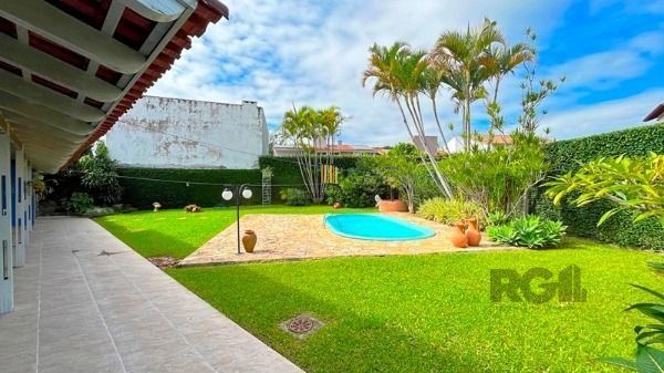 Casa em Porto Alegre, no bairro Ipanema, com 3 dormitório(s), à venda.