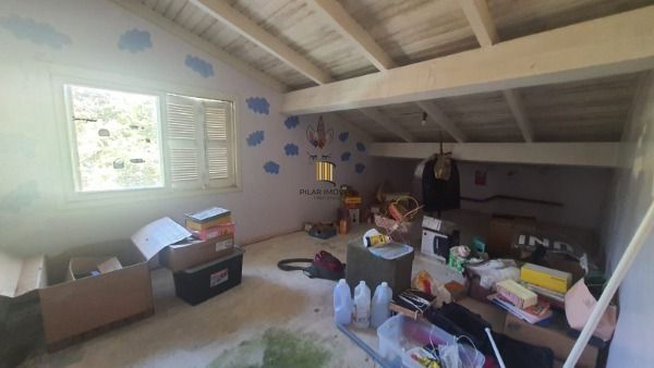 Casa em Porto Alegre, no bairro Vila Nova, com 3 dormitório(s), e 3 banheiros, à venda.