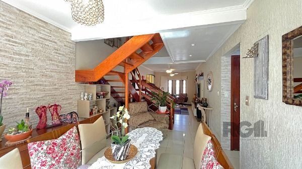 Casa Condominio em Porto Alegre, no bairro Ipanema, com 3 dormitório(s), e 3 banheiros, à venda.