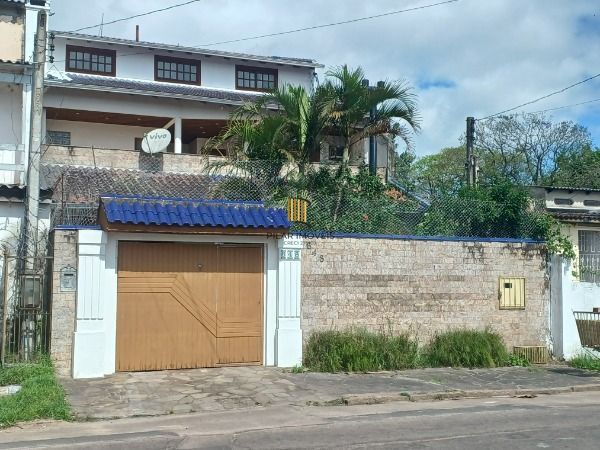Casa em Porto Alegre, no bairro Restinga, com 4 dormitório(s), e 4 banheiros, à venda. - Pilar Imóveis