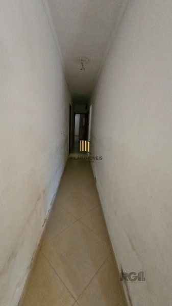 Casa 3 dormitórios no bairro Camaquã