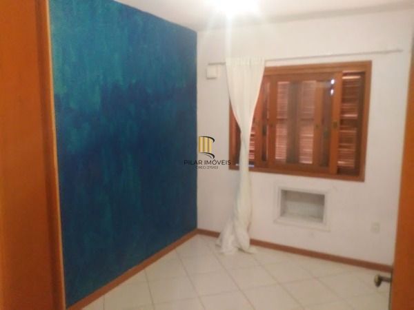 Casa 3 dormitórios no bairro Guarujá