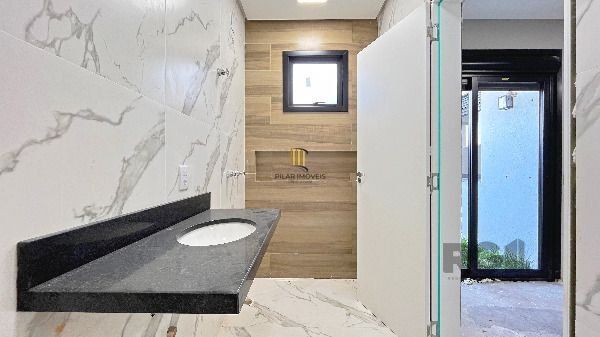 Casa Condominio em Porto Alegre, no bairro Hípica, com 3 dormitório(s), e 3 banheiros, à venda.