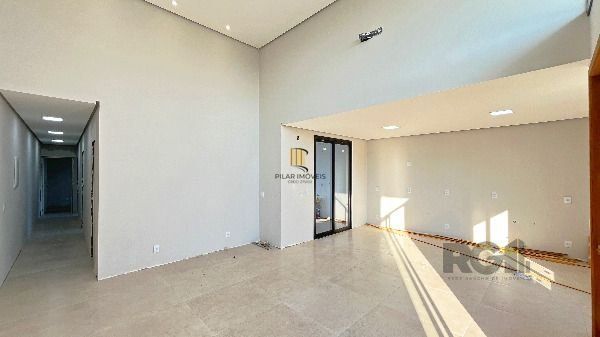 Casa Condominio em Porto Alegre, no bairro Hípica, com 3 dormitório(s), e 3 banheiros, à venda.