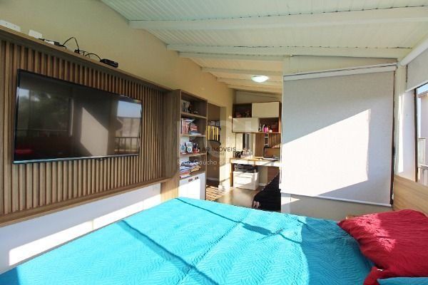 Casa Condominio em Porto Alegre, no bairro Ipanema, com 3 dormitório(s), e 3 banheiros, à venda.