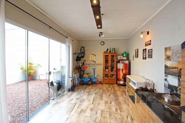 Casa em Porto Alegre, no bairro Hípica, com 3 dormitório(s), e 3 banheiros, à venda.