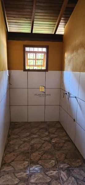 Sobrado em Porto Alegre, no bairro Vila Nova, com 3 dormitório(s), e 3 banheiros, à venda.