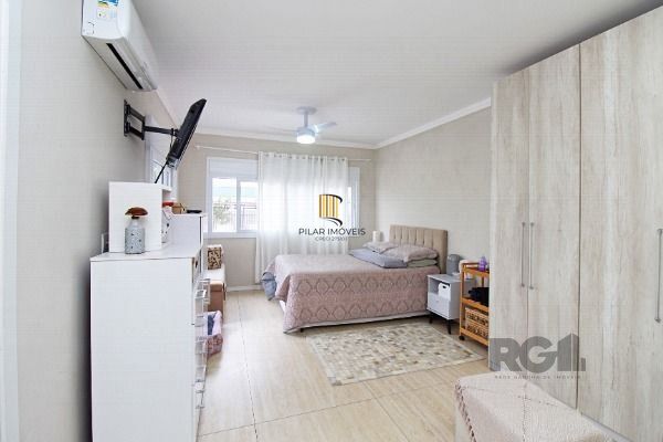 Casa em Porto Alegre, no bairro Hípica, com 3 dormitório(s), e 3 banheiros, à venda.